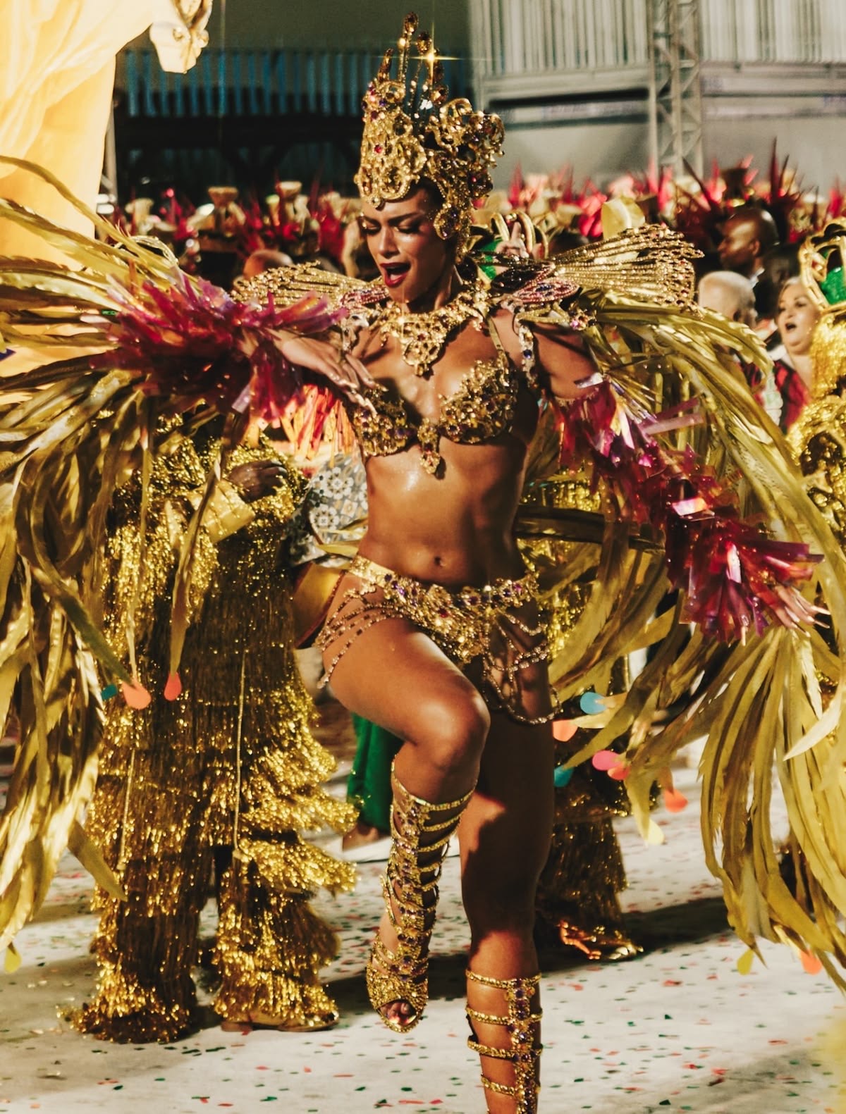 Carnival dancer in an elaborate golden costume